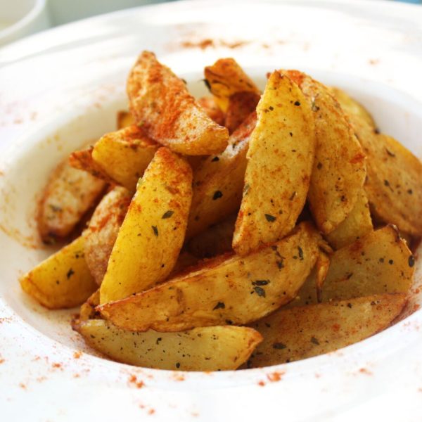 Gajos o Cuñas de papas sazonadas con especias crujiente